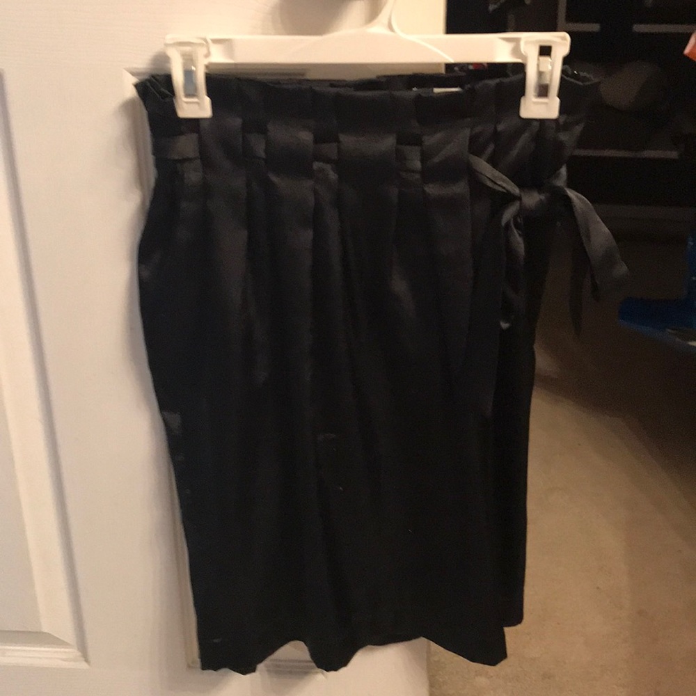 Black satin paperbag waist skirt.